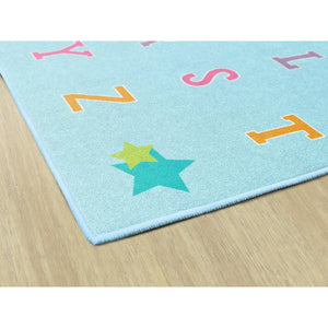 Schoolgirl Style Alphabet On Blue Criss Cross Rugs