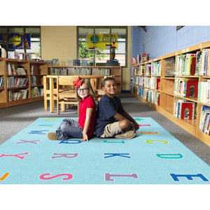 Schoolgirl Style Alphabet On Blue Criss Cross Rugs
