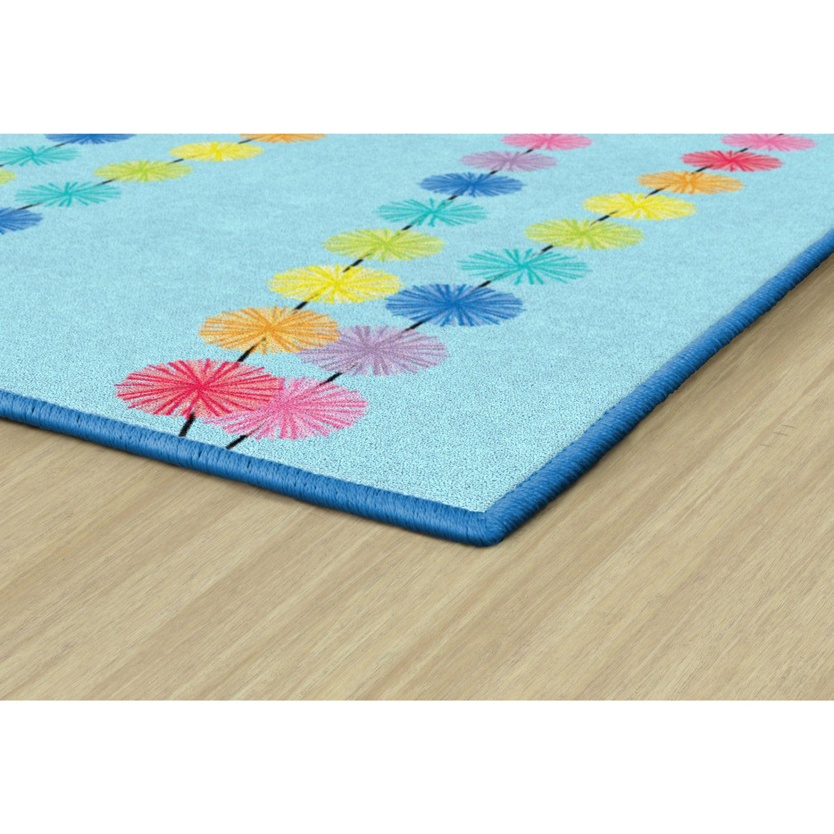 Schoolgirl Style Rainbow Poms On Blue Rugs