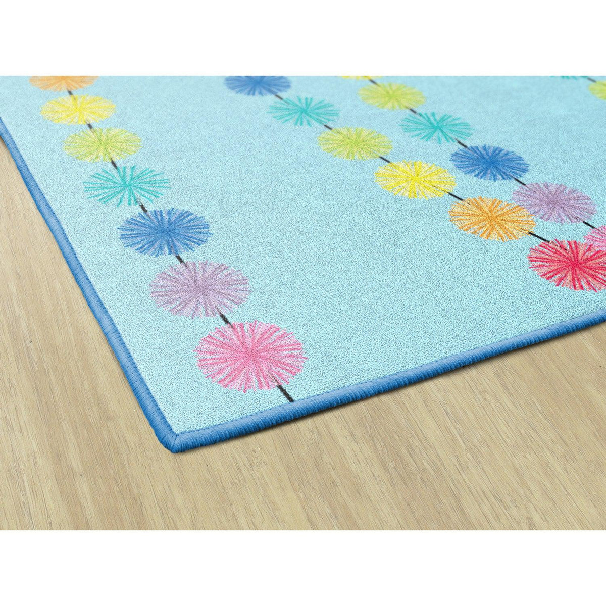 Schoolgirl Style Rainbow Poms On Blue Rugs